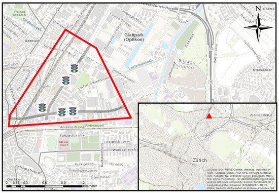 Figure 2. Test area (in red), Zurich Switzerland. The highlighted network in gray indicates the road segments where data is collected and processed. The traffic light symbols indicate the five implemented traffic control systems.